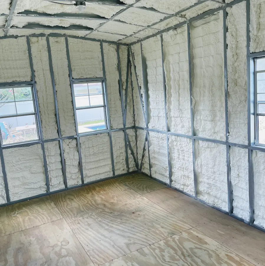 Closed-cell spray foam insulation applied to wall cavities in a residential project in Iowa Park
